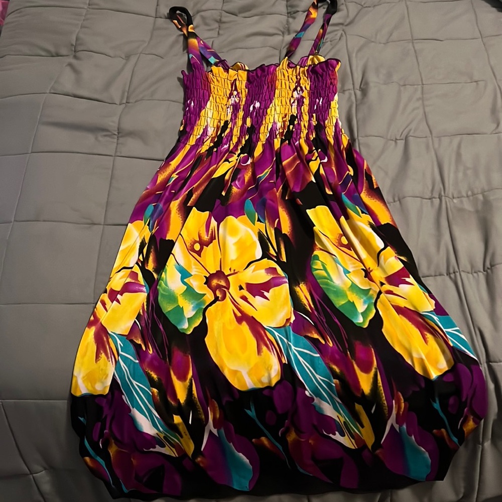 Colorful and perfect for a beach cover up or just a pretty dress